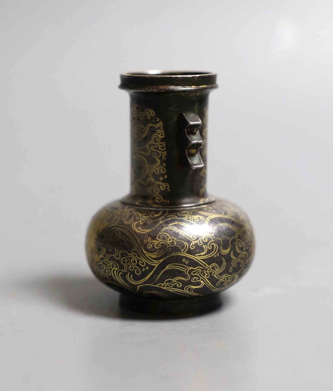 A Japanese mixed metal small vase, signed , 6.5 cms high